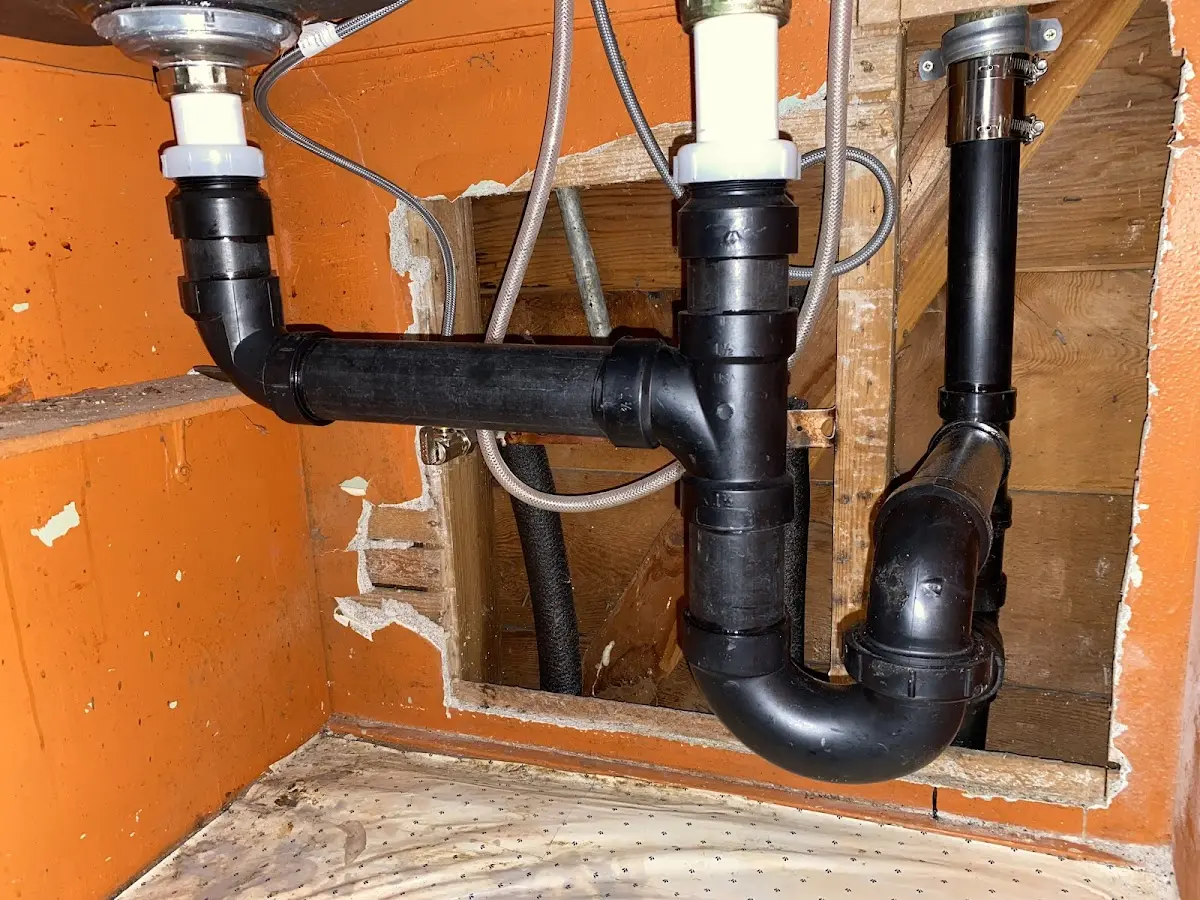 Professional Garbage Disposal Repair equipment and tools on the job in Gleneagle
